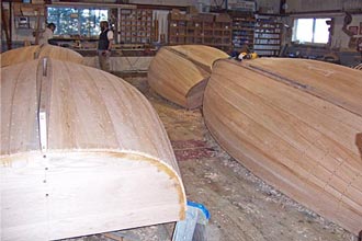Wooden Beetle Cat hulls under construction